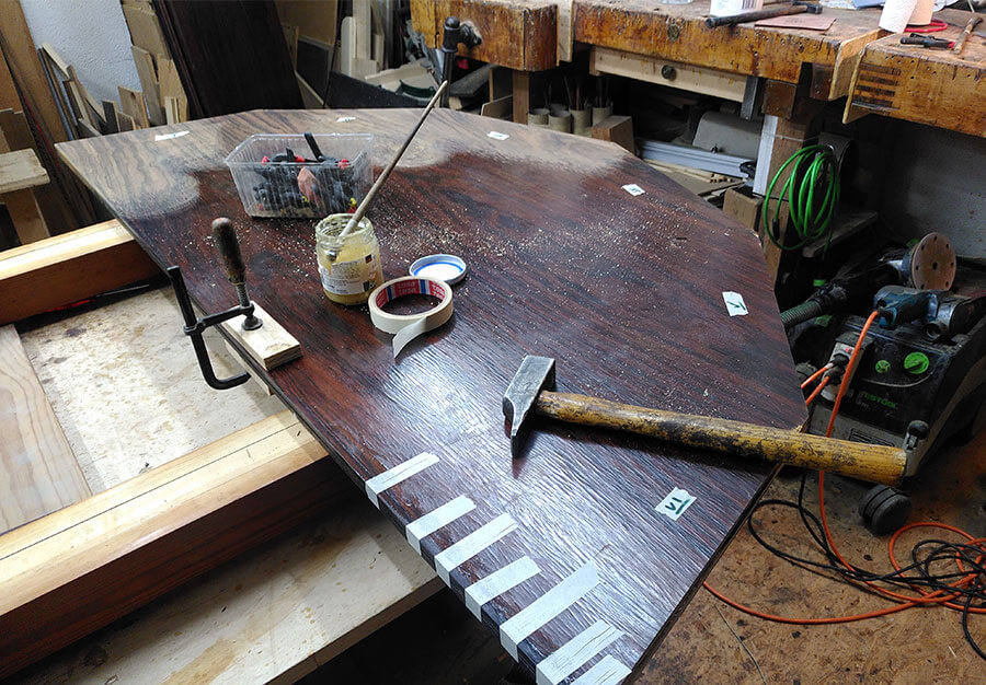 Restauration table à rallonges en palissandre